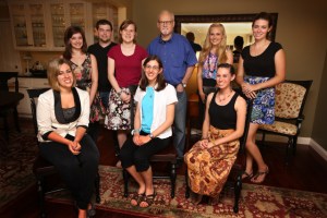 Jerry B. Jenkins, author of the Left Behind series, standing with PWR students he helped financially.